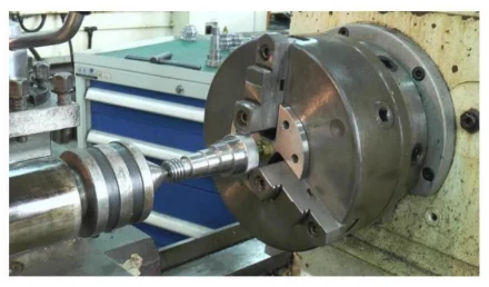 Figure 6 Machining shaft type parts using a new type of shim with a three jaw chuck